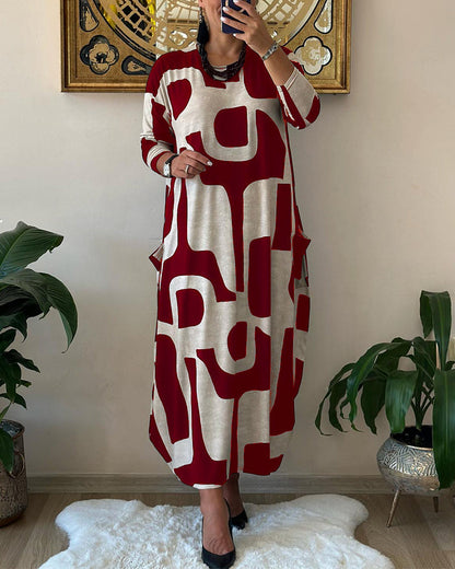 👗【Doprava zadarmo】Voľnočasová módna šaty s okrúhlym výstrihom a dlhou potlačenou sukňou s dlhým rukávom
