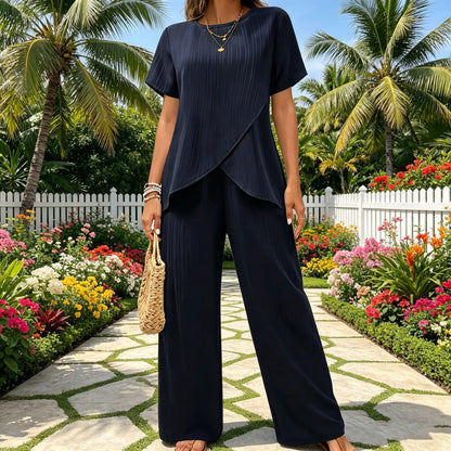 👗 Komplet damski S–3XL – luźny krój, krótki rękaw, okrągły dekolt, asymetryczny fason (top + spodnie)