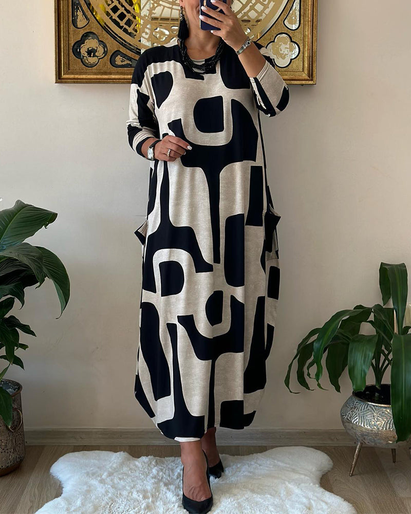 👗【Doprava zadarmo】Voľnočasová módna šaty s okrúhlym výstrihom a dlhou potlačenou sukňou s dlhým rukávom