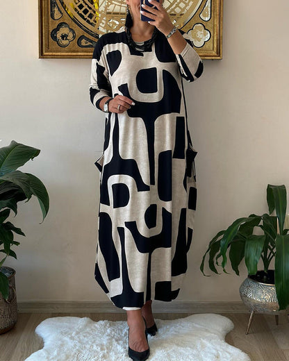 👗【Doprava zadarmo】Voľnočasová módna šaty s okrúhlym výstrihom a dlhou potlačenou sukňou s dlhým rukávom
