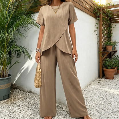 👗 Komplet damski S–3XL – luźny krój, krótki rękaw, okrągły dekolt, asymetryczny fason (top + spodnie)