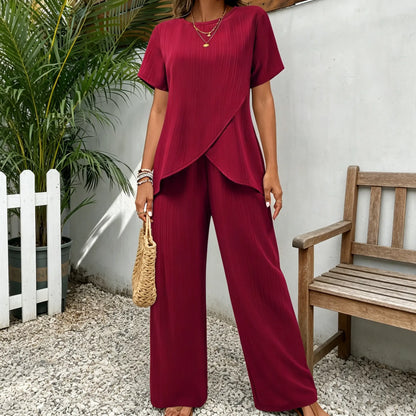 👗 Komplet damski S–3XL – luźny krój, krótki rękaw, okrągły dekolt, asymetryczny fason (top + spodnie)