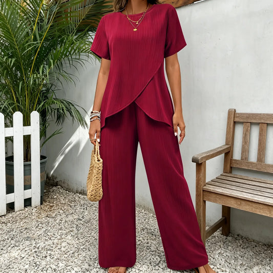 👗 Komplet damski S–3XL – luźny krój, krótki rękaw, okrągły dekolt, asymetryczny fason (top + spodnie)